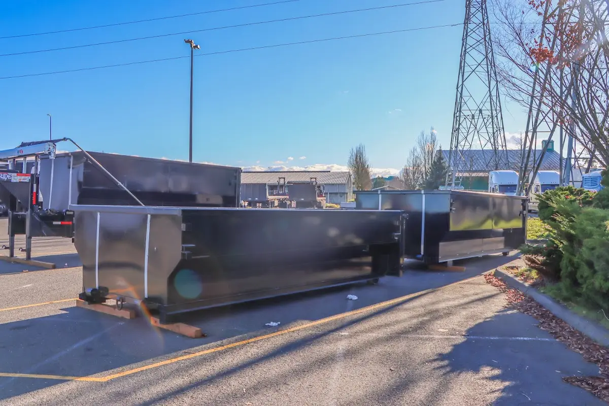 Roll-off dumpster ready for waste disposal at job site for Concrete Dumpster Rental in Warren